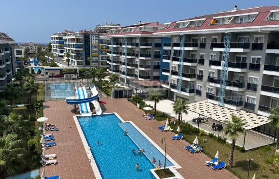 Двухуровневая квартира 2+1 в Кестель, 300 м до моря в Турции - фото 3