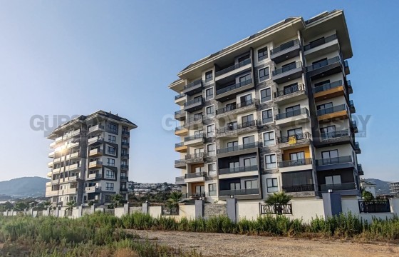 Квартира 1+1 с прямым панорамным видом на море в Демирташе в Турции - фото 4