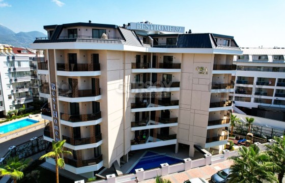 Стильная меблированная квартира в элитном комплексе в Обе возле моря в Турции - фото 2