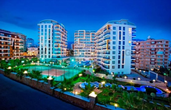 Просторная квартира 2+1 в элитном комплексе в районе Тосмур в Турции - фото 1