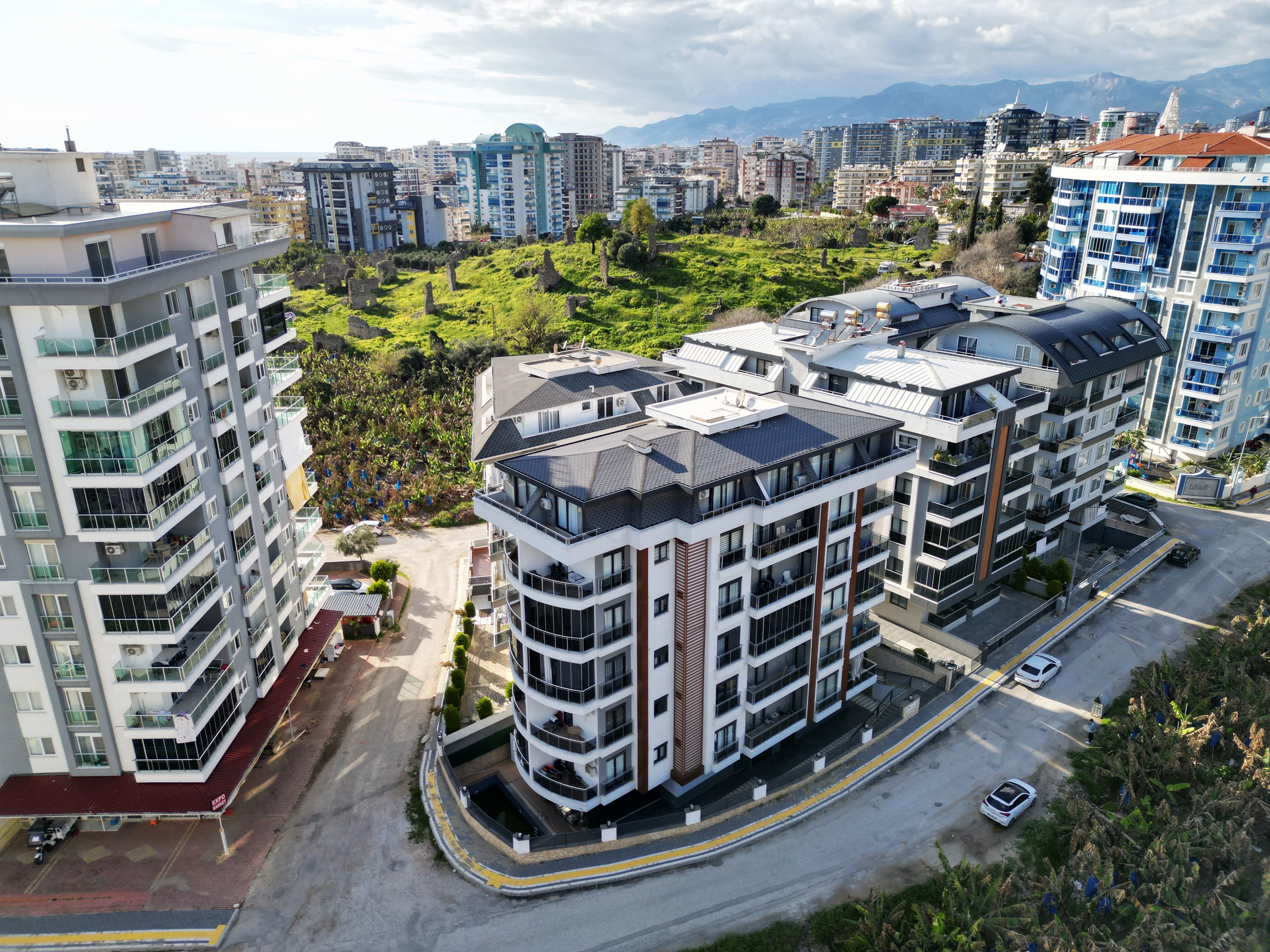 Уютная квартира планировкой 1+1 в районе Махмутлар в Турции - фото 1