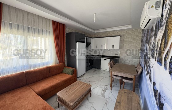 Квартира 1+1 с мебелью в новом доме, район Махмутлар 600 м до моря в Турции - фото 3