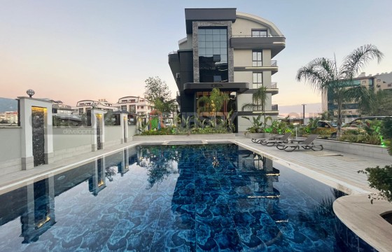 Квартира 1+1 с удобствами и близостью к морю в Обa в Турции - фото 2