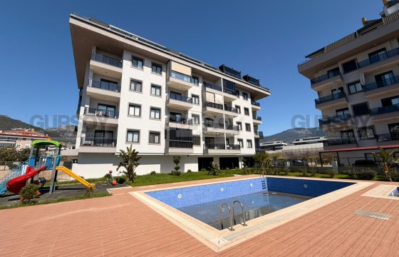 Меблированная квартира 1+1 в Обе в комплексе с инфраструктурой в Турции - фото 4