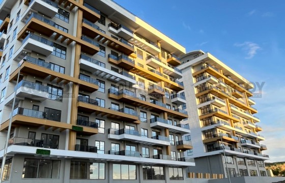 Меблированная квартира 1+1 в новом комплексе в центре Махмутлара в Турции - фото 3