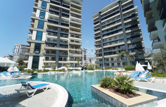 Квартира 1+1 с полной инфраструктурой в новом комплексе в районе Mahmutlar в Турции - фото 3