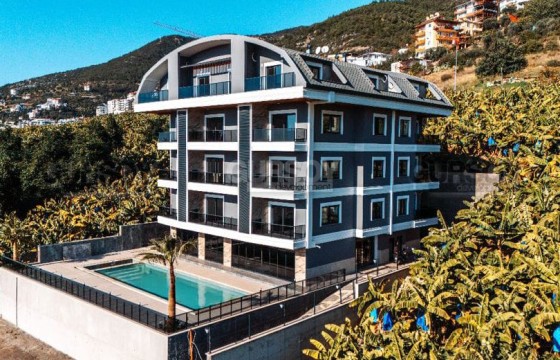 Квартира 1+1 в новом комплексе с видом на море рядом с море на Клеопатре в Турции - фото 3