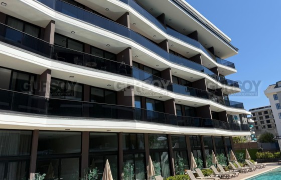 Просторная квартира 1+1 всего в 450 метрах от знаменитого пляжа Клеопатра в Турции - фото 11