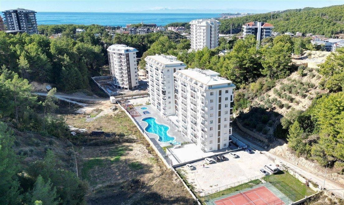 Квартира 1+1 с видом на лес и бассейн в новом комплексе, Авсаллар в Турции - фото 5