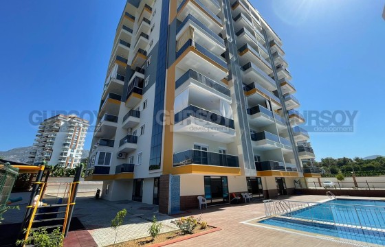 Квартира 1+1 в современном комплексе в центре Махмутлара в Турции - фото 2