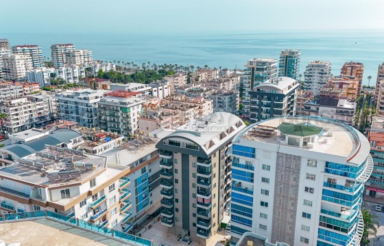 Инвестиционная квартира  1+1 в новом комплексе рядом с морем в Махмутларе в Турции - фото 1