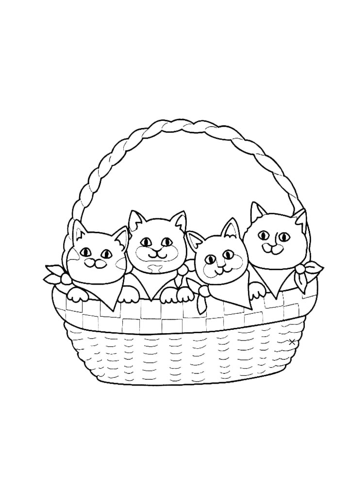 Милые котята в корзине