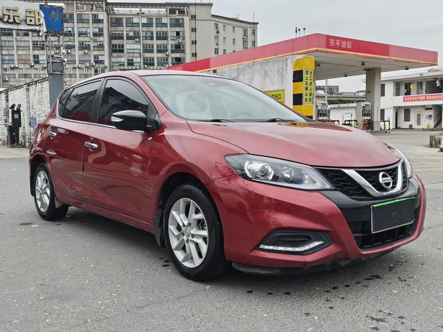 Nissan Tiida - фото 2