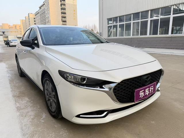 Mazda 3 Axela - фото 2