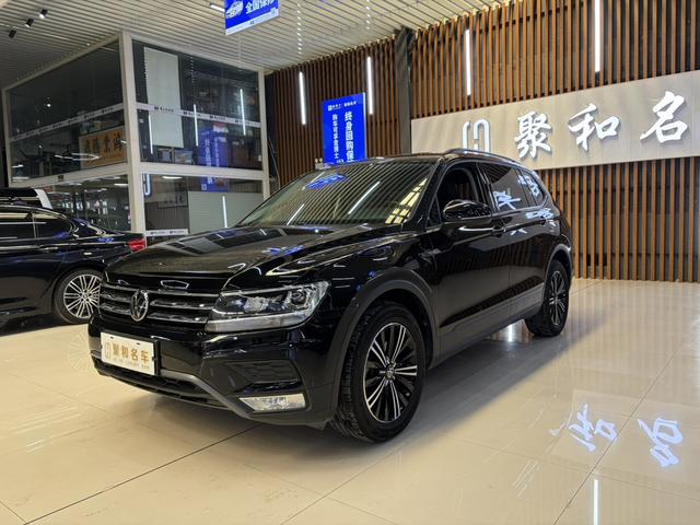 Volkswagen Tiguan L - фото 0