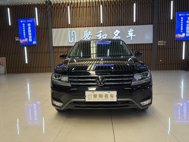 Volkswagen Tiguan L - фото 1