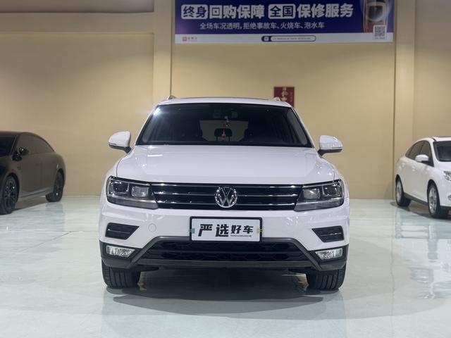 Volkswagen Tiguan L - фото 1
