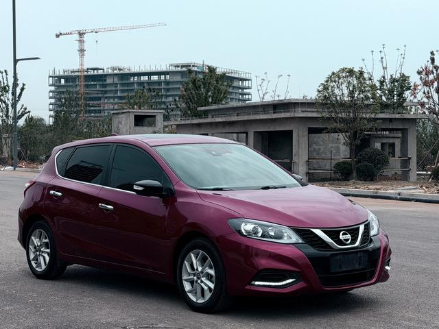 Nissan Tiida - фото 2