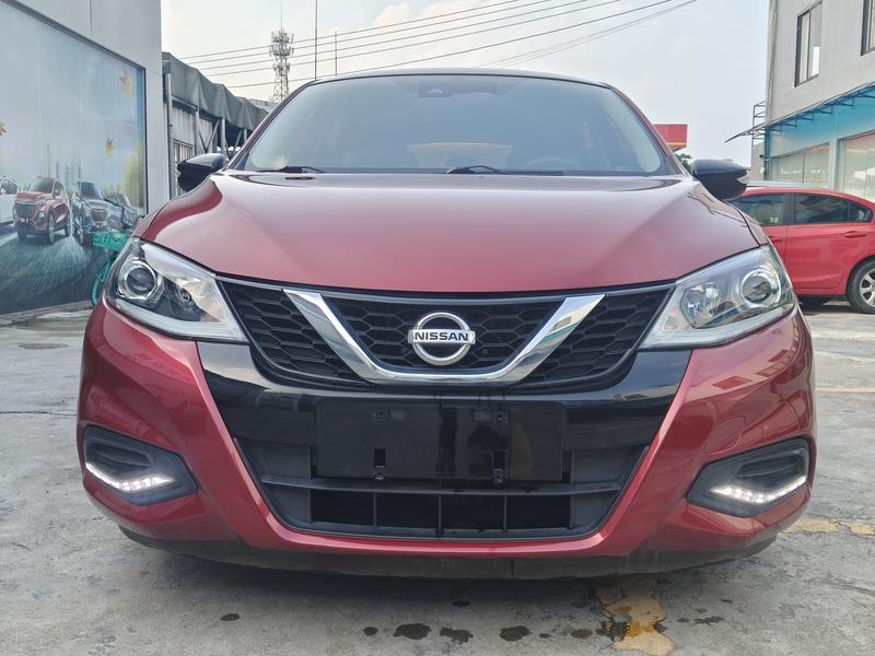 Nissan Tiida - фото 1