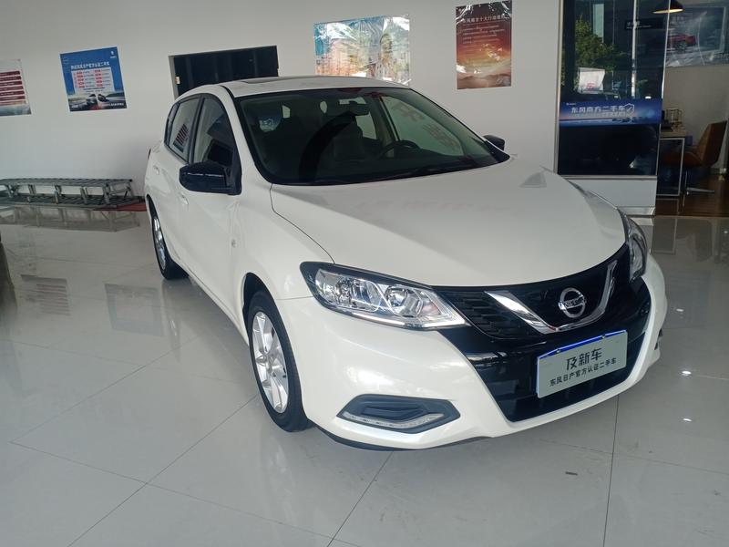 Nissan Tiida - фото 2