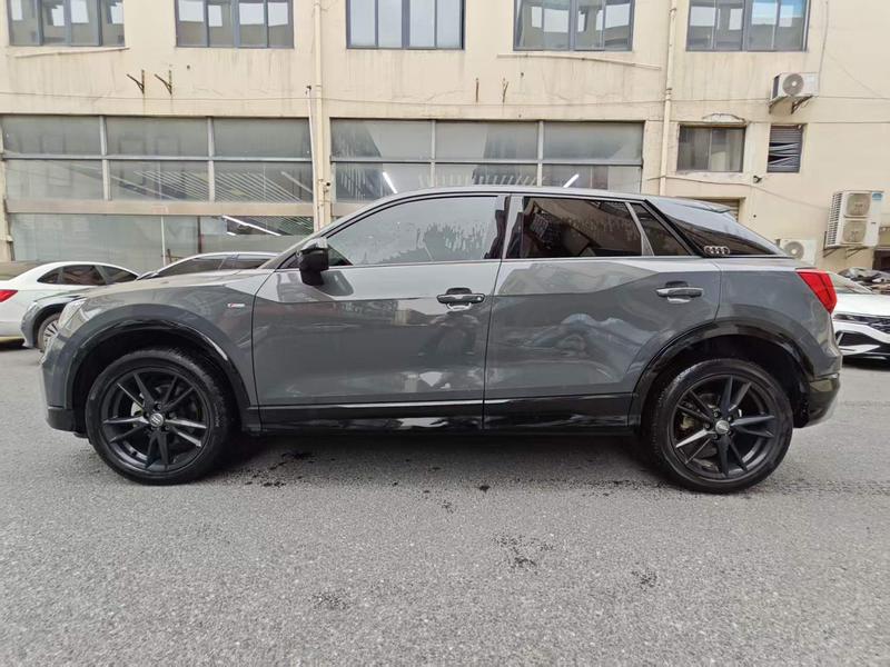 Audi Q2L - фото 2